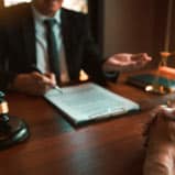 Attorney Providing Legal Advice For Business And Property Settlements After A Divorce Procedure In Glendale
