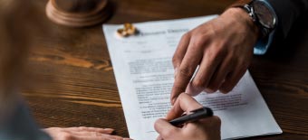 Man Signing Papers For Legal Separation