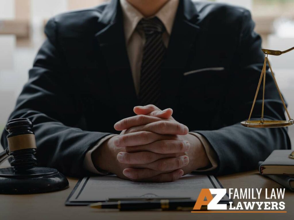A professional lawyer sitting at a desk with hands clasped, a golden scale of justice, and a gavel, symbolizing legal authority and expertise in family law