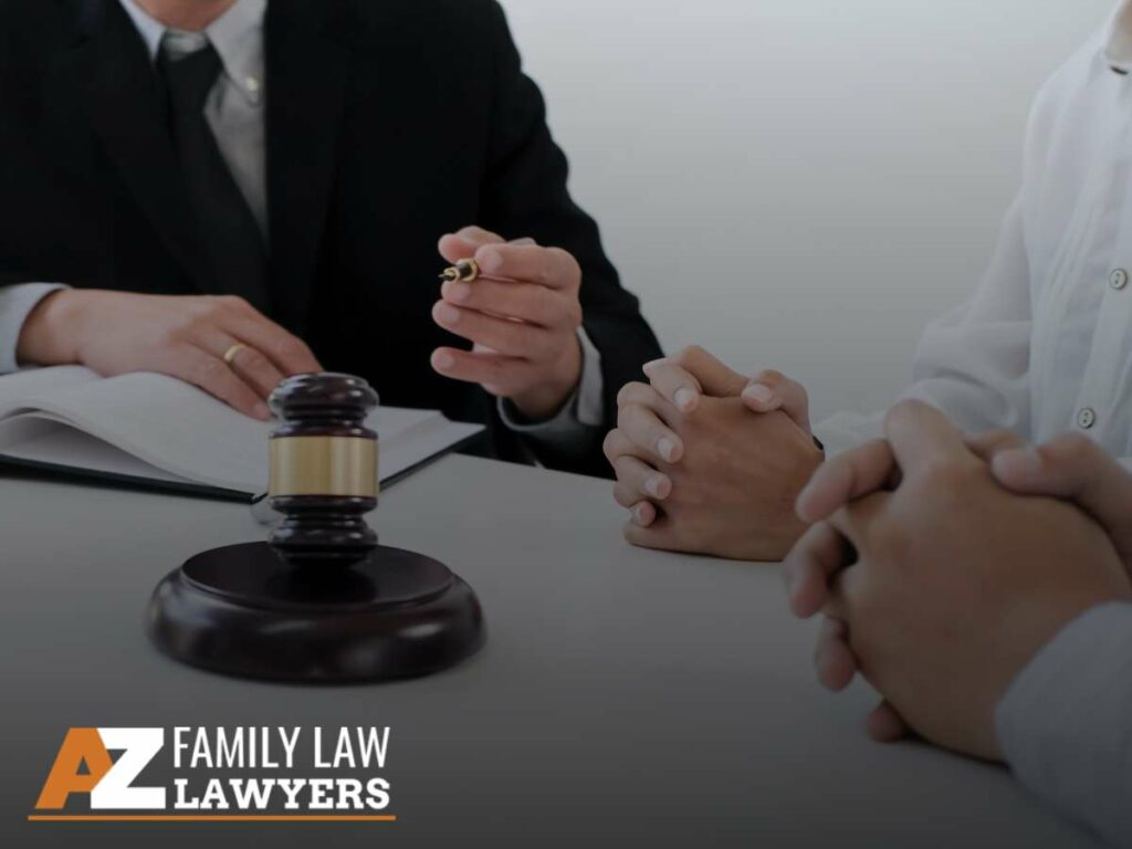 Two individuals and a lawyer discussing a case, with a gavel in the center, related to Arizona divorce cases